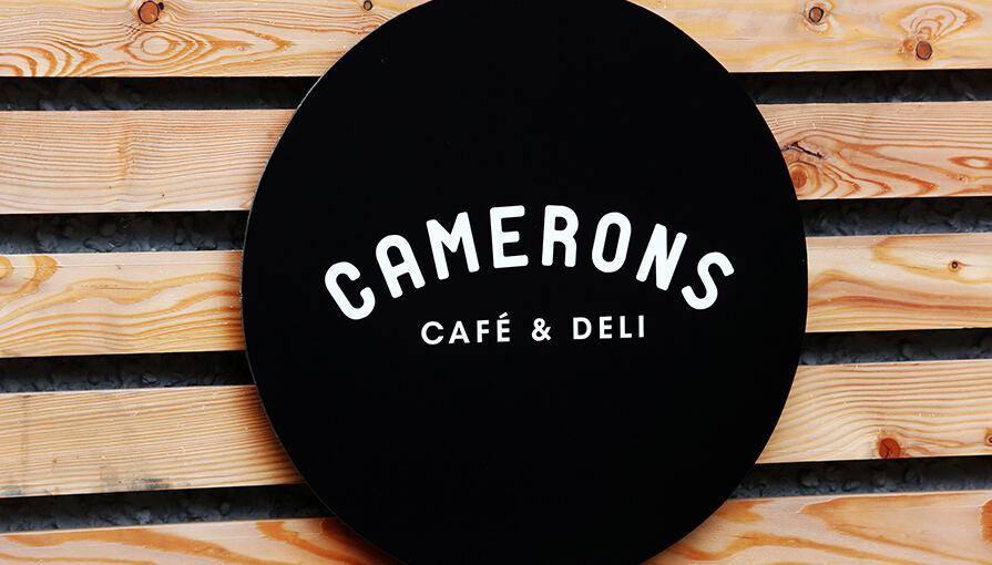 Cameron's Café & Deli sign